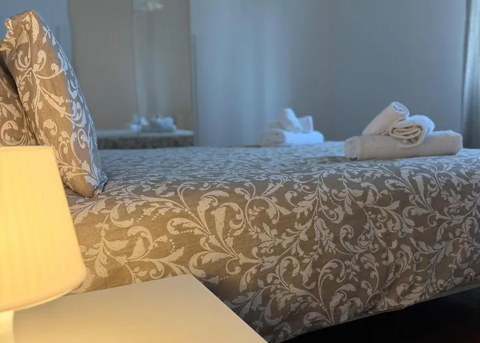 Re *