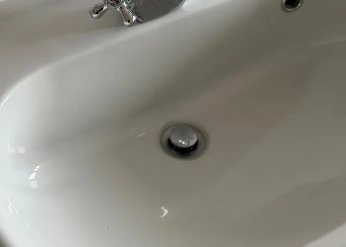 Re *